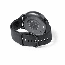 A black fitness tracker with a round face and adjustable strap, featuring a logo on the back.