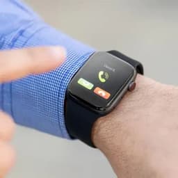 A smartwatch with a black strap, displaying a call interface on the screen.
