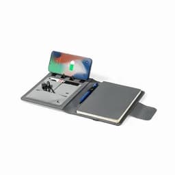 A grey portfolio with a notepad, a pen, and pockets for a phone and accessories. It features branding.