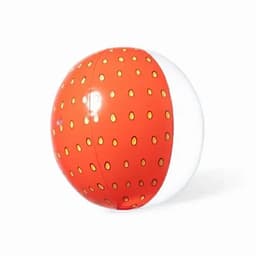 An inflatable beach ball with an orange and white design, featuring yellow dots on the orange section.