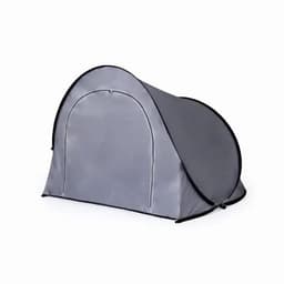 A grey pop-up tent featuring a rounded shape and an entrance, designed for outdoor use.