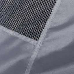 A grey fabric featuring a mesh section, showcasing a textured surface.