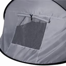 A tent featuring a grey fabric with a mesh window and black trim. It has a simple, collapsible design.