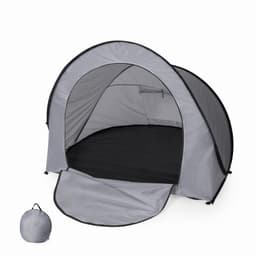 A grey pop-up tent with a black interior, accompanied by a matching carry bag.