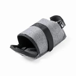 A grey fabric pouch with a black strap, featuring a zipper closure and an internal compartment. It has a logo.