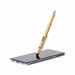 A multifunctional pen with a wooden finish, balanced upright on a smartphone screen.