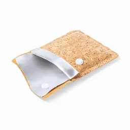 A cork pouch with a silver lining and a snap closure, showcasing natural textures and earthy tones.