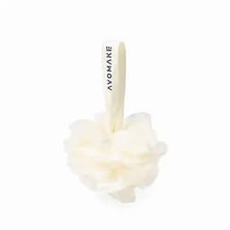 A shower loofah in soft white with a fabric hanging strap featuring a logo.