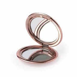 A rose gold compact mirror with a hinged lid, featuring two reflective surfaces inside.