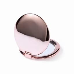 A compact mirror with a shiny rose gold exterior, featuring a smooth surface and a reflective interior.
