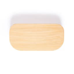 A bamboo-like rectangular tray with rounded edges. The surface has a light wooden finish and a plain design.