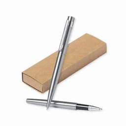 A silver pen resting beside its brown cardboard box. The pen features a sleek design and a shiny clip.
