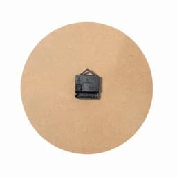 A round cork board with a small black clip attached to the centre. The board is a light brown colour.