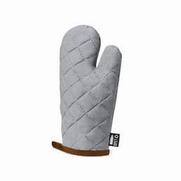 A grey quilted oven mitt with a brown leather trim and a logo tag on the side.