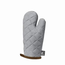 A grey quilted oven mitt with a textured surface and a brown leather-like grip at the bottom. It has a small branding label.