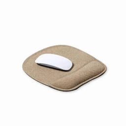 A mouse pad in beige with a soft wrist rest, featuring a white computer mouse on top.