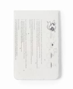 A product card with instructions and illustrations for a seed starter kit, featuring a light, natural colour.
