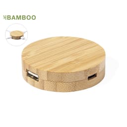 A round bamboo charging station with two USB ports, featuring a natural wood finish and a smooth surface.