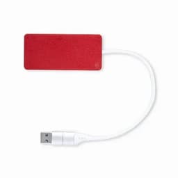 A red USB device with a white connector cable. The design is sleek and minimalistic.
