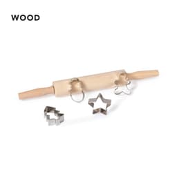 A wooden rolling pin with metal cookie cutters in star and bear shapes, alongside a circular cutter.