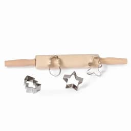 A wooden rolling pin with stainless steel cookie cutters in star and circular shapes.