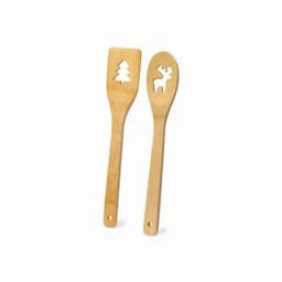 A set of bamboo cooking utensils, featuring cut-out designs of a tree and a reindeer. The utensils are light brown.