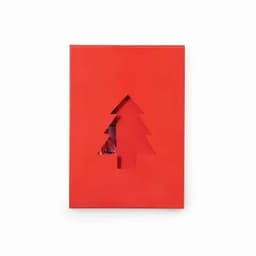 A red gift box with a cut-out Christmas tree design, revealing colourful contents inside.