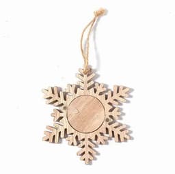 A wooden snowflake ornament with a natural finish and a hanging twine loop.