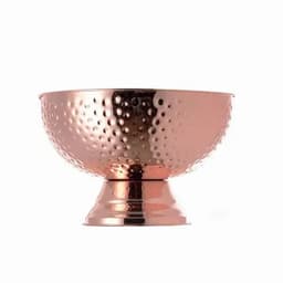 A copper-hued bowl with a hammered texture, featuring a wide rim and a sturdy pedestal base.