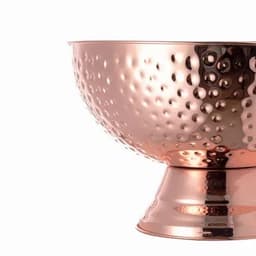 A decorative bowl with a polished copper finish and a textured, dimpled surface.