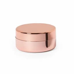 A round, rose gold container with a smooth, reflective surface and a secure lid.