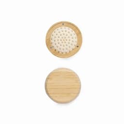 A round bamboo product with a textured top and smooth bottom, featuring a circular design and logo.
