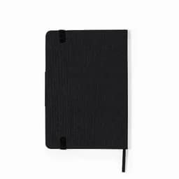 A black notebook with a textured cover, featuring an elastic band and a ribbon bookmark. It has a logo on the front.