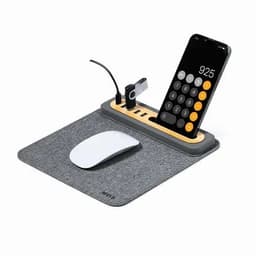 A desk mat in grey featuring a phone holder, USB ports, and a mouse. The mouse is white and sleek in design.