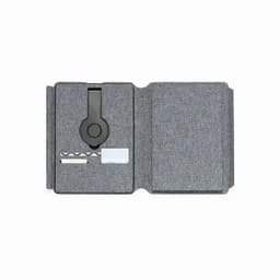 A grey promotional folder featuring a black clip and various card slots, ideal for organising documents.