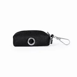 A black zippered pouch with a silver loop attachment, featuring a circular design element.
