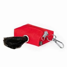 A red dispenser pouch with a zip closure and a roll of black bags, featuring a clip for attachment.