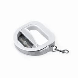 A pet leash with a grey strap and a white handle, featuring a built-in storage compartment.