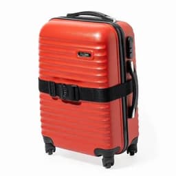 A suitcase in bright red with a textured finish, featuring a black harness strap and four wheels for mobility.