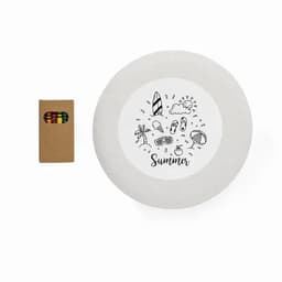 A round white frisbee features summer-themed illustrations and has a sticker logo; includes a small box of crayons.