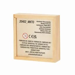 A wooden puzzle box with a light brown finish and a logo, featuring small parts warnings in multiple languages.