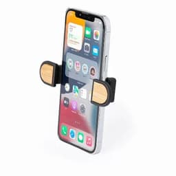 A smartphone holder featuring a black and wooden design, securely gripping a phone with a cutout for screen visibility.