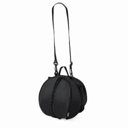 A black bag with a round shape and detachable strap, featuring zippered compartments and a handle.