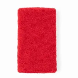 A red, fluffy towel with a textured surface, featuring a rectangular shape. It has no visible branding.
