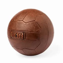 A brown leather soccer ball with a textured surface and stitching details, featuring a logo on one side.
