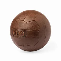 A brown leather ball with a distinctive design, featuring stitched details and grooves on the surface.