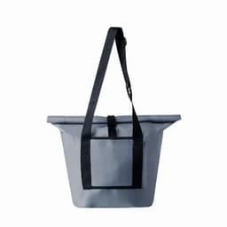 A grey tote bag with a black strap and a front pocket. Features a fold-over top with a fastening.
