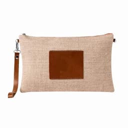 A clutch bag made of beige fabric with a brown leather patch and a detachable strap.