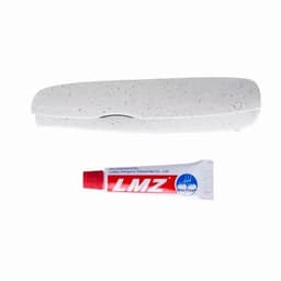 A white stapler with a speckled design and a small tube of adhesive in red and white. The stapler features a logo.