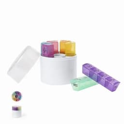 A pill organiser featuring a round white container with colourful compartments for different days of the week.